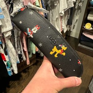Authentic Disney x Coach pencil case, NWT.